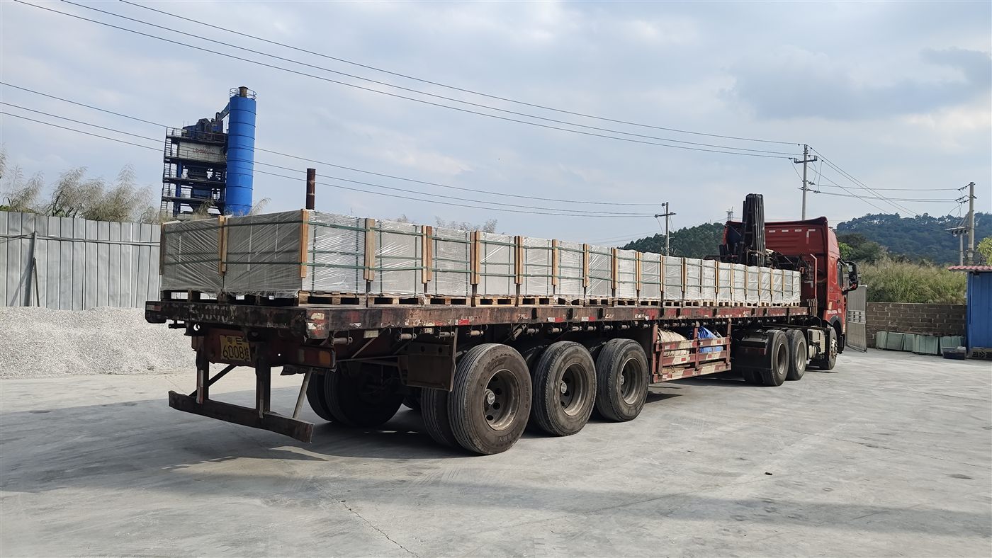 Loading containers at TASHI factory